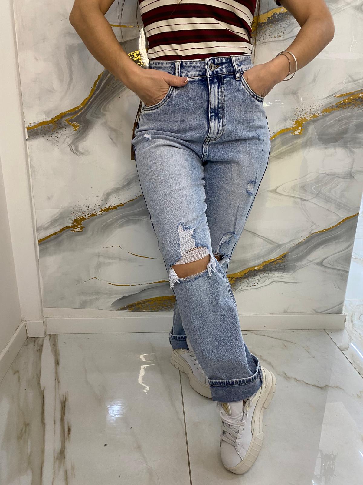jeans skinny strappo